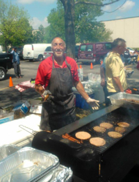 nick-serves-hamburgers-at-chicago-jondon-customer-appreciation-day